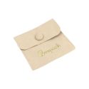 Microfiber pouch with earring pad, flap and button closure, sand